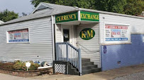 K & M Currency Exchange, Inc. 01